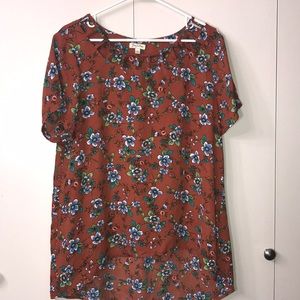 Flowers blouse covers all the way to your but